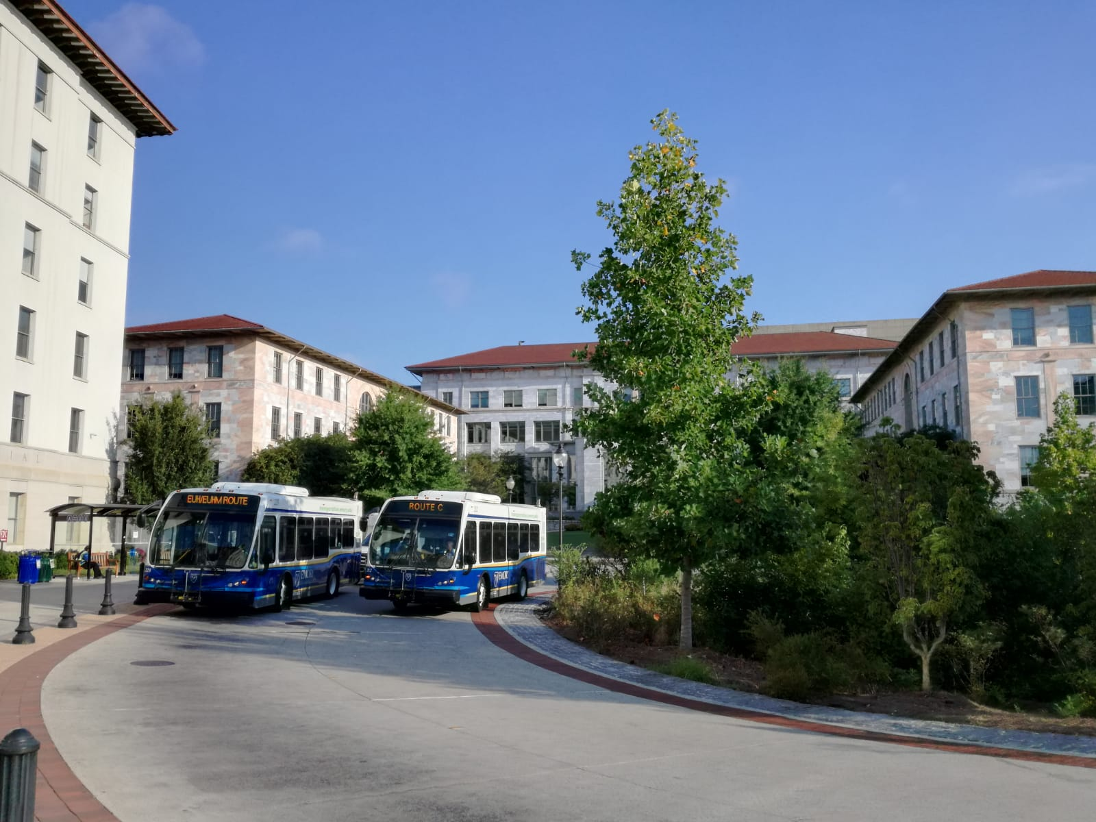 Free shuttles on the Emory campus with School of Medicine in the background